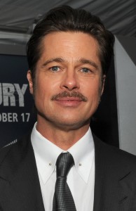 Actor Brad Pitt, the star of the movie, who plays the part of “Wardaddy/Don Collier”, gives interviews with the Mr. John Bradley and Lisa Fernandez of the Defense Media Activity on the “Red Carpet” during the world premiere of the movie Fury at the Newseum in Washington D.C. (Department of Defense photo by Marvin Lynchard)